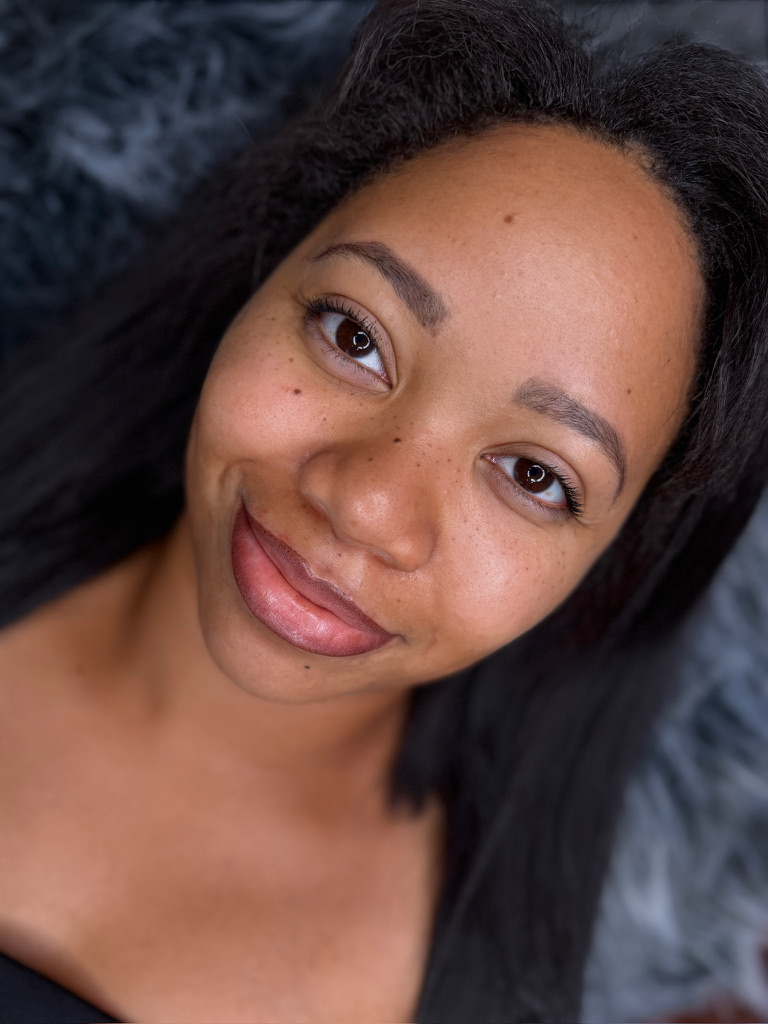 Healed faux freckles on nose and cheeks — natural sun-kissed finish
